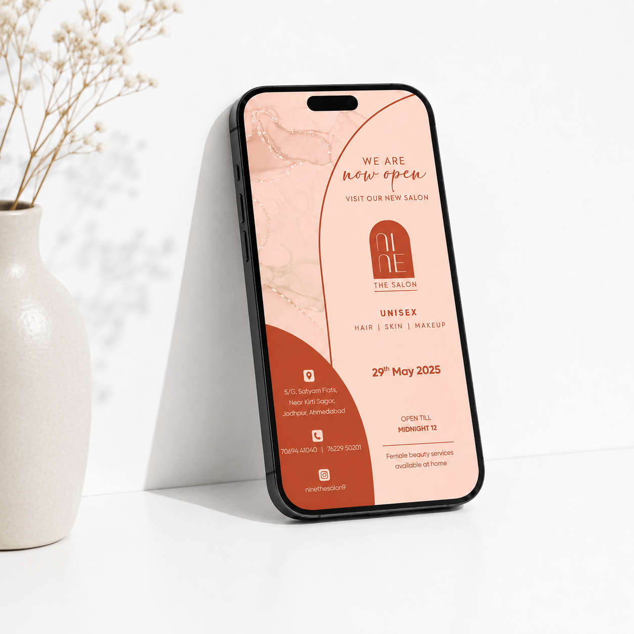 Nine The Salon opening invitation on a phone mockup